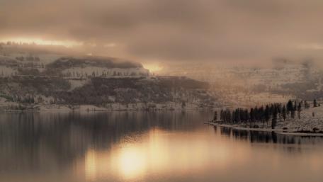 Serene Winter Reflections on a Calm Lake wallpaper