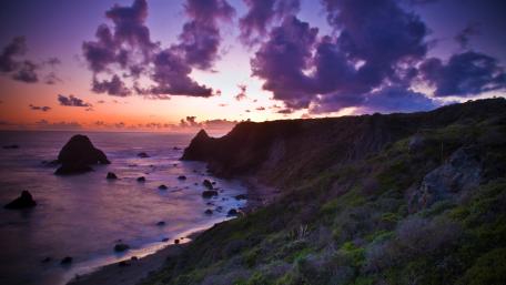 Serenity at Dusk Over the Coastal Cliffscape wallpaper
