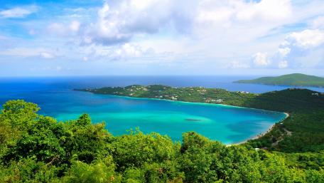 Tropical Paradise View Over Crystal Clear Waters wallpaper