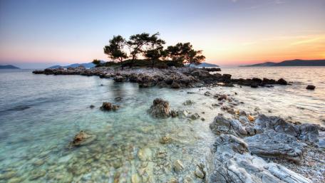 Tranquil Islet by the Sea at Dusk wallpaper