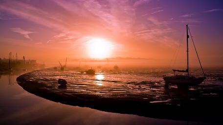 Serene Sunset Over Calm Waters wallpaper