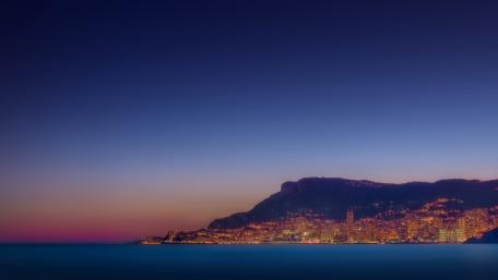 Serene Coastal City at Dusk wallpaper