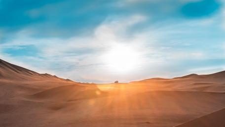 Golden Sunlight Over Desert Dunes wallpaper
