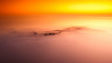 Serene Sunset Over Tranquil Waters wallpaper