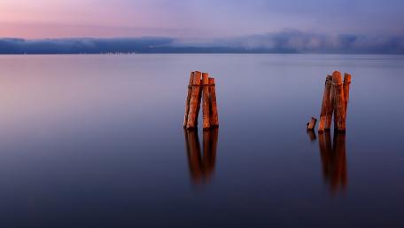 Serene Reflections on Calm Waters wallpaper