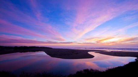 Mystical Purple Sunset by the Waterway wallpaper