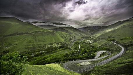 Mystical Curves in Lush Green Hills wallpaper
