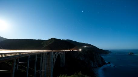 Serene Night Over the Coastal Highway wallpaper