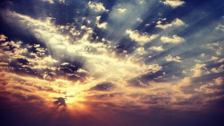 Golden Rays Breaking Through the Clouds wallpaper