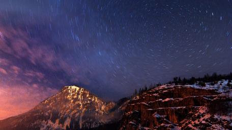 Celestial Journey Across the Night Sky wallpaper