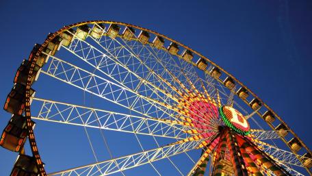 Colorful Ferris Wheel Against a Night Sky wallpaper