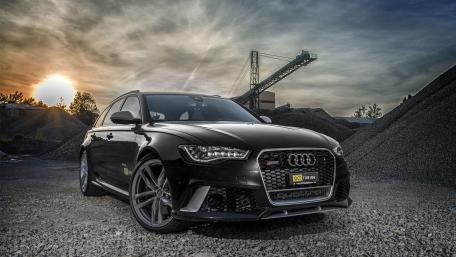 Sleek Black Audi RS6 in a Stunning Landscape wallpaper
