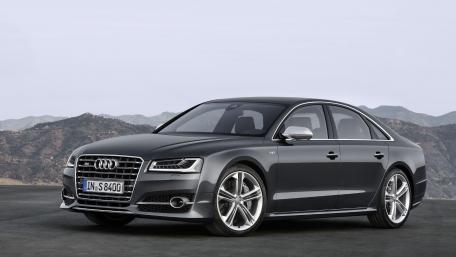 Sleek Audi A8 in Scenic Mountain Landscape wallpaper