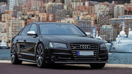 Sleek Audi A8 by the Mediterranean Sea wallpaper
