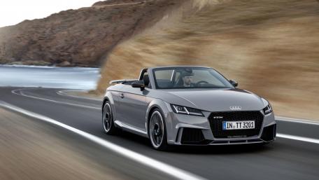 Sleek Audi TT Cabriolet on the Open Road wallpaper
