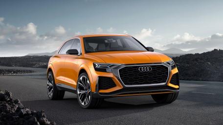 Dynamic Audi Q8 in Bold Orange Shade wallpaper