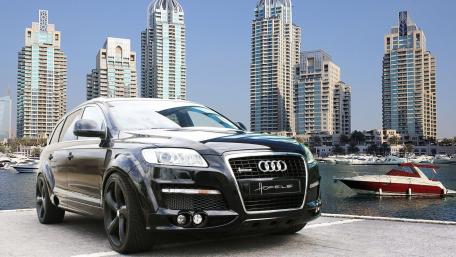 Sleek Audi Q7 Against Urban Skyline View wallpaper