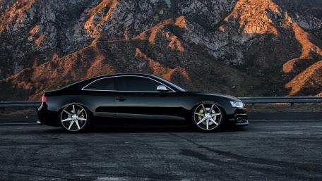 Sleek Audi S5 Against Majestic Mountainscapes wallpaper