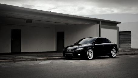 Sleek Black Audi in Urban Setting wallpaper