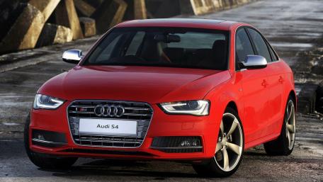 Sleek Audi S4 in Bold Red Colorful Design wallpaper