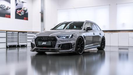 Sleek Audi RS4 in a Modern Garage Setting wallpaper