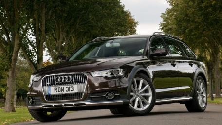 Sleek Audi in a Scenic Park Setting wallpaper