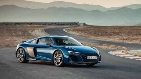 Sleek Audi R8 on a Scenic Roadway wallpaper