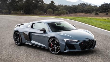 Sleek Audi R8 on a Scenic Roadway wallpaper