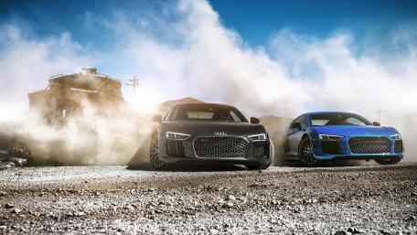 Sleek Audi R8s in Action on Dusty Terrain wallpaper
