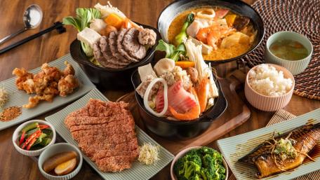 Delicious Asian Fusion Feast with a Variety of Dishes wallpaper