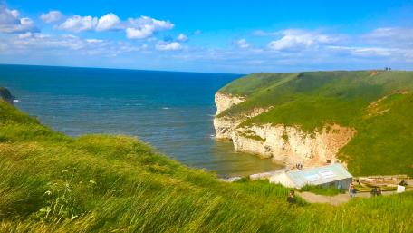 Coastal Serenity under a Blue Sky wallpaper