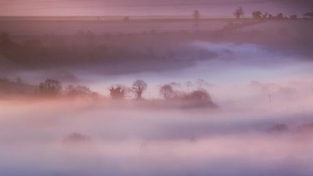 Mystical Fog Shrouded Landscape wallpaper
