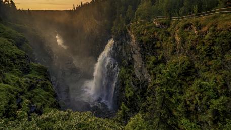 Majestic Waterfall in Lush Greenery wallpaper
