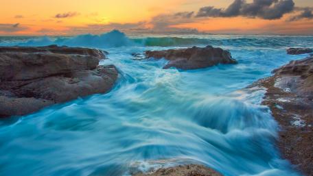 Ocean's Dance at Sunset Shore wallpaper