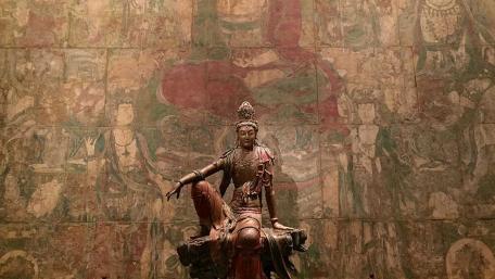 Serene Statue Against Historic Wall Art wallpaper
