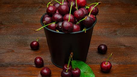 Fresh Cherries in a Rustic Bucket wallpaper