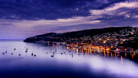 Serene Twilight Over a Coastal Town wallpaper
