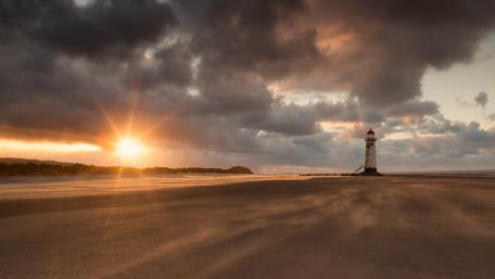 Serene Lighthouse at Sunset wallpaper