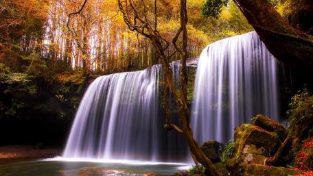 Autumn Waterfall in Tranquil Forest Scene wallpaper