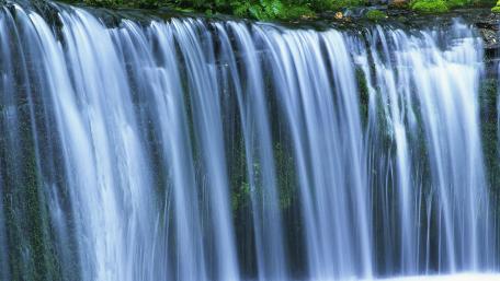 Serenity of Nature's Waterfall wallpaper