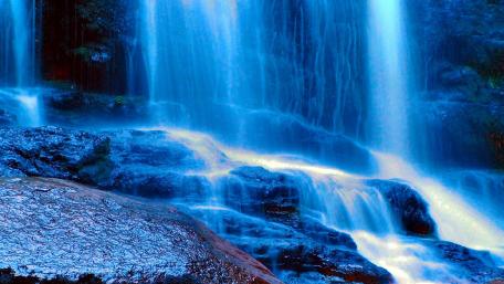 Majestic Blue Waterfall in Nature Scene wallpaper
