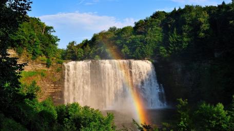 Majestic Waterfall with Vibrant Rainbow wallpaper