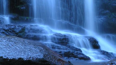 Serenity of a Cascading Waterfall wallpaper