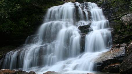 Serenity of Nature's Waterfall wallpaper