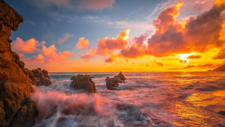 Sundown Splendor at Rocky Seashore wallpaper