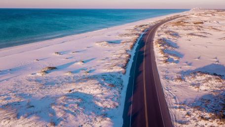 Winter Road Along the Sea's Edge wallpaper