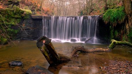 Serenity of Nature's Waterfall wallpaper