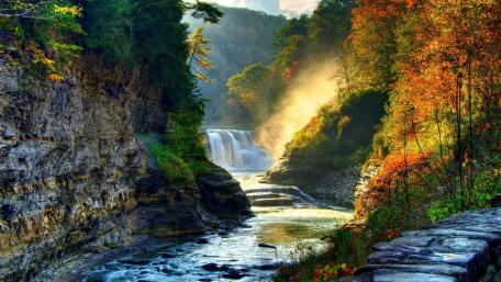 Majestic Autumn Waterfall in a Forest Paradise wallpaper