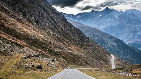 Majestic Mountain Road Adventure wallpaper