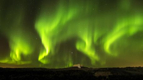 Ethereal Dance of the Aurora Borealis wallpaper
